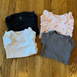 Set of 4 long sleeved bodysuit / onesies - good preowned condition - 12-18M